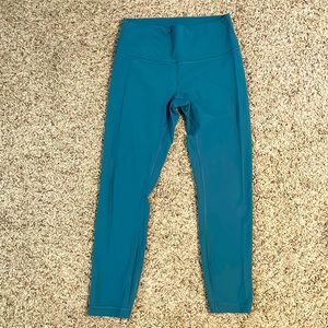 Blue Lululemon wonder unders. Lightly worn. Size 8.